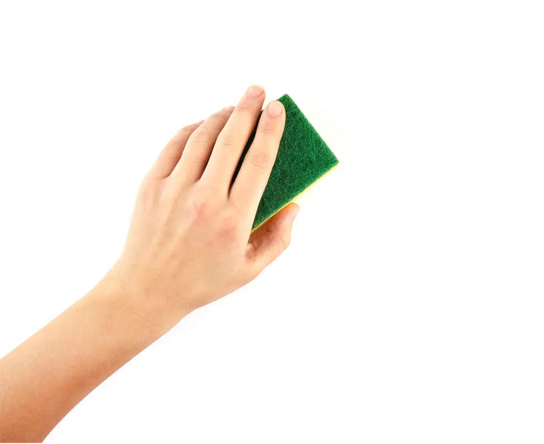 hand holding a yellow sponge