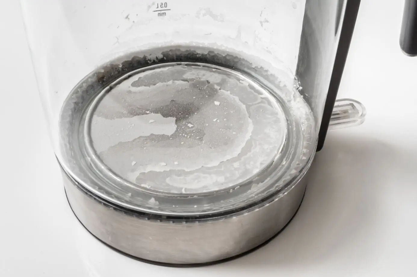 limescale build up at the bottom of a clear kettle