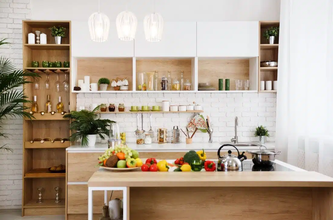 well organised dining room with assorted fruits and vegetables on the countertop